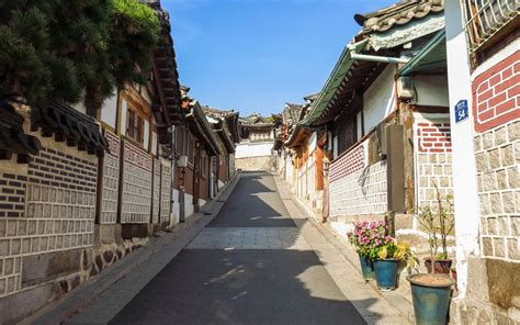 What is the differences between Bukchon Hanok Village and .